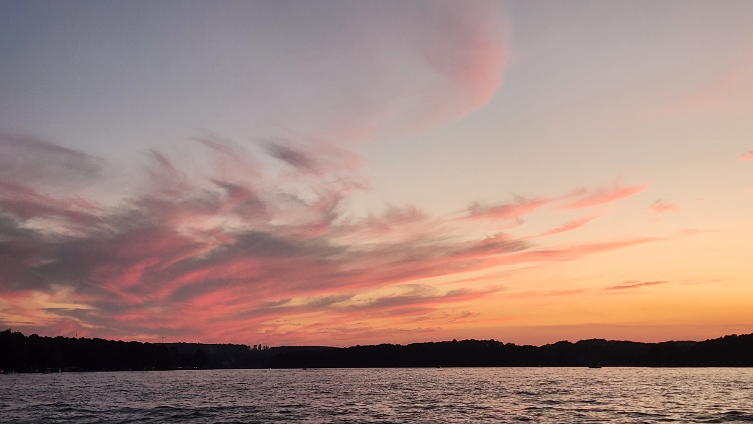 A wide pastel sunset over Lake Tillery